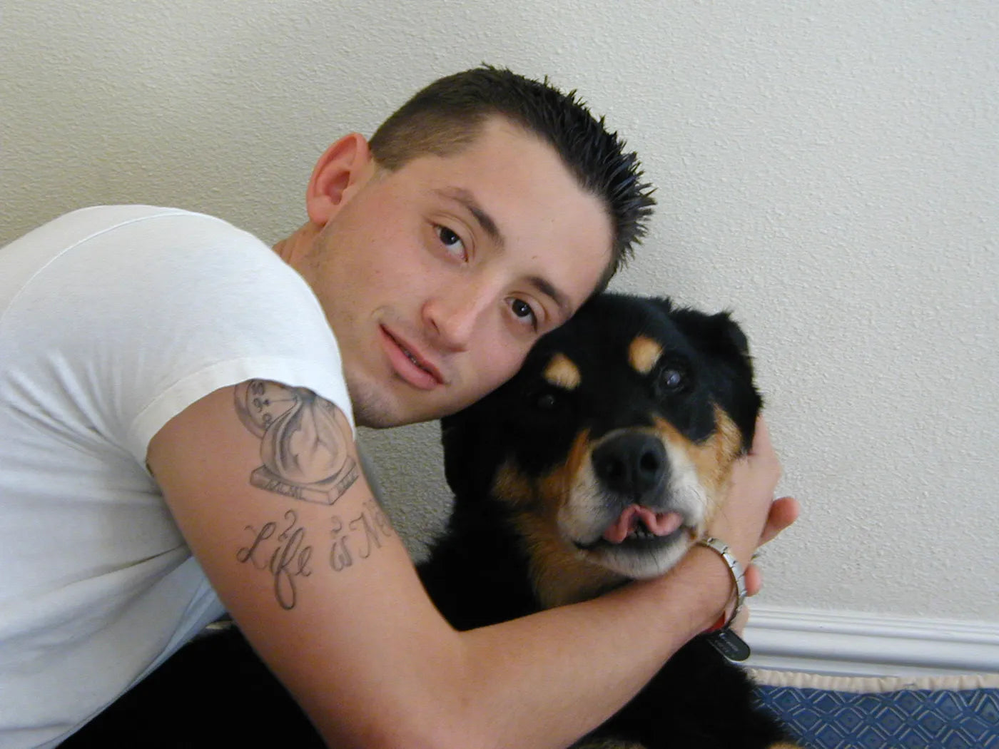 A young man hugging Woodrow